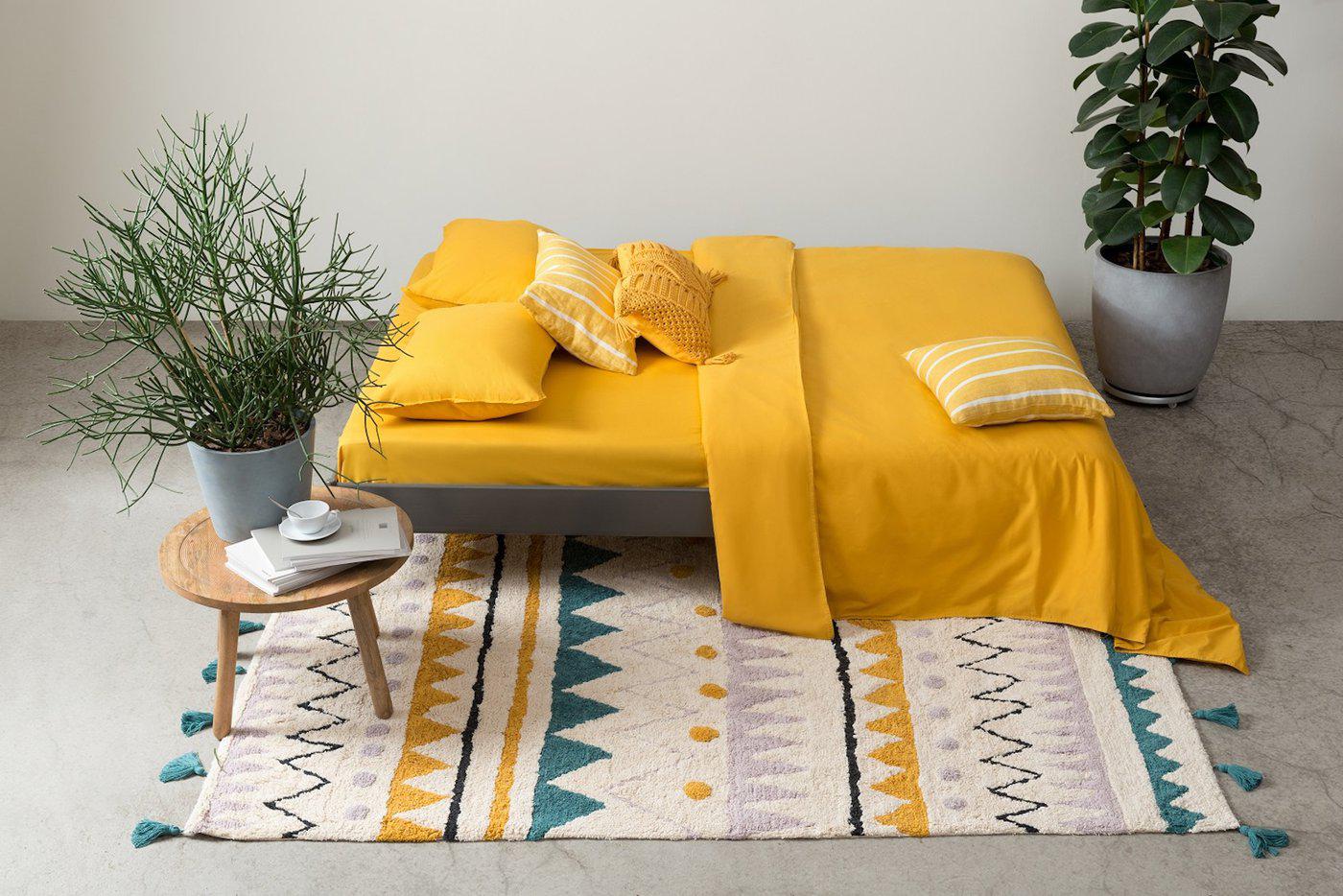 Ковёр из хлопка с контрастным этническим орнаментом из коллекции Ethnic бренда Tkano.