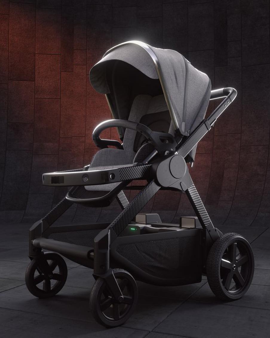 Коляска будет ехать рядом с родителями во время прогулки и укачивать малыша, давая взрослым время на себя