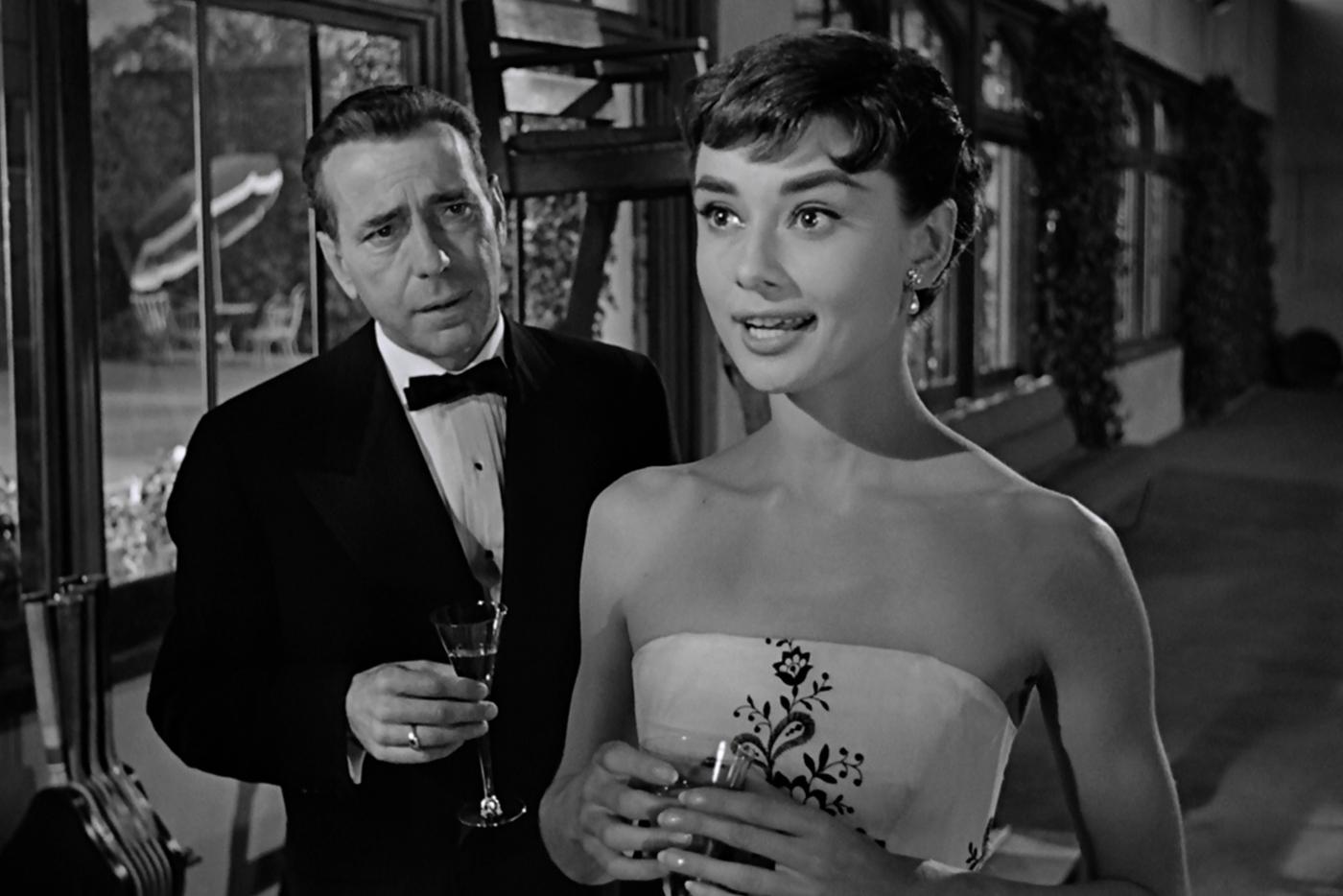 Хамфри Богарт и Одри Хепбёрн в фильме "Сабрина" (1954).