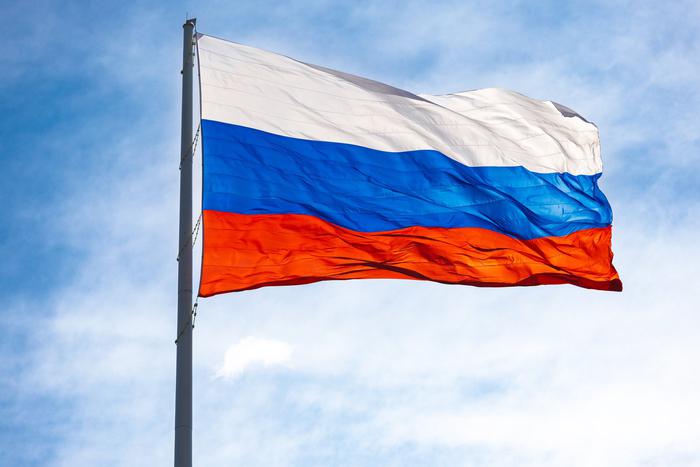 Российский флаг вывесили во время матча сборных США и Чехии на Олимпиаде