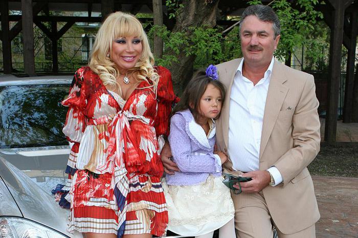 Мария Захарова с родителями.