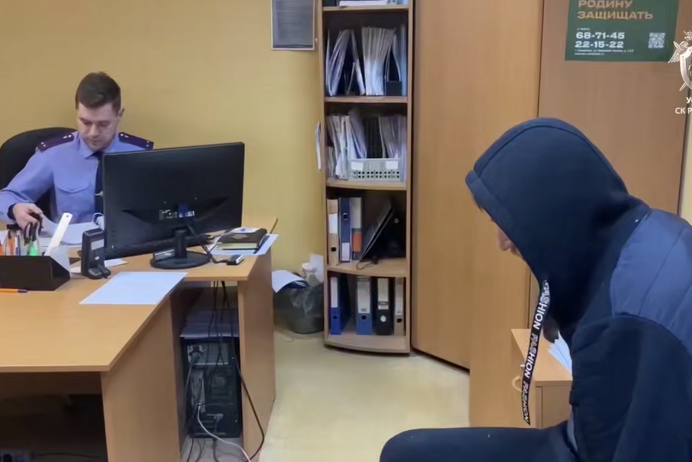 Задержанный на допросе