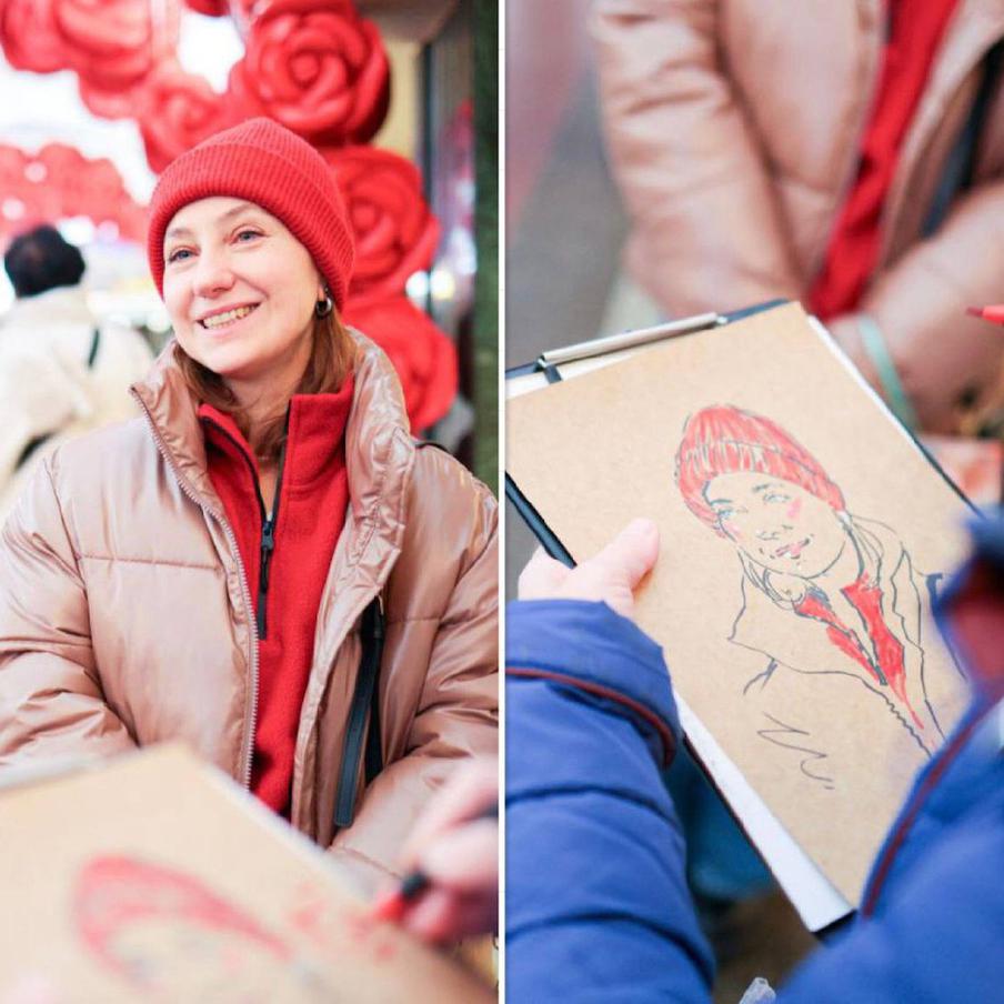 Портреты девушкам рисовали на станции метро "Трубная", украшенной гигантскими алыми розами.