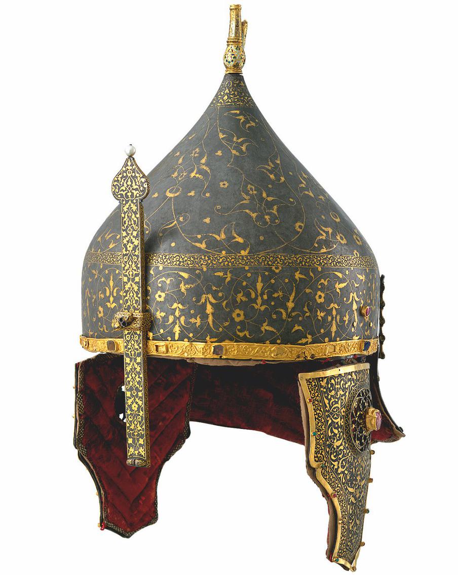 Шлем "Шапка Кучумовская". Иран (?), Средняя Азия (?), XVI в.; навершие с плюмажной трубкой –
Западная Европа (?), Россия (?), первая половина XVII в. Музеи Московского Кремля.