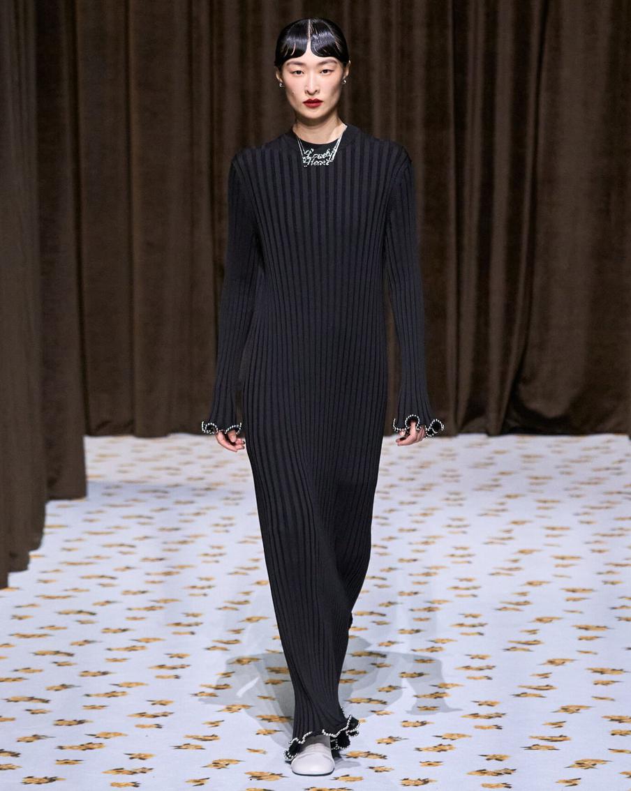 Модель на показе Jil Sander.